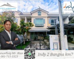 For rent: 2-story townhome near Mega Bangna, best location in the area, Indy 2 Bangna Km. 7. The front has an electric awning and shade trees. The back has an awning that can be opened or closed and the floor is neat. Beautiful house, ready to move in.