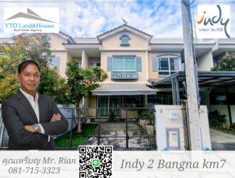 For rent: 2-story townhome near Mega Bangna, best location in the area, Indy 2 Bangna Km. 7. The front has an electric awning and shade trees. The back has an awning that can be opened or closed and the floor is neat. Beautiful house, ready to move in.